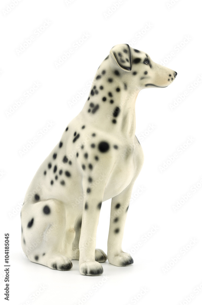 Statuette of dog  isolated on white background