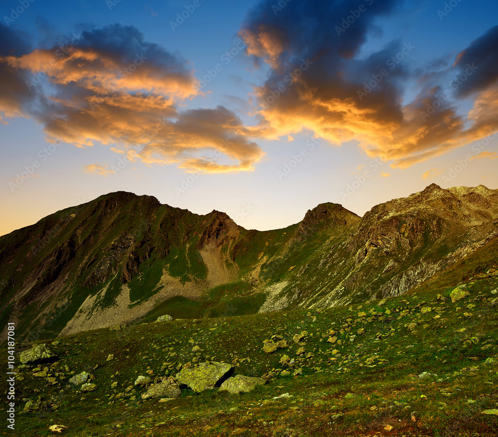 Obraz premium Mountain landscape in Switzerland Alps at sunset - canton Graubunden.