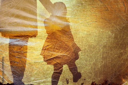 Shadow of a little girl and woman