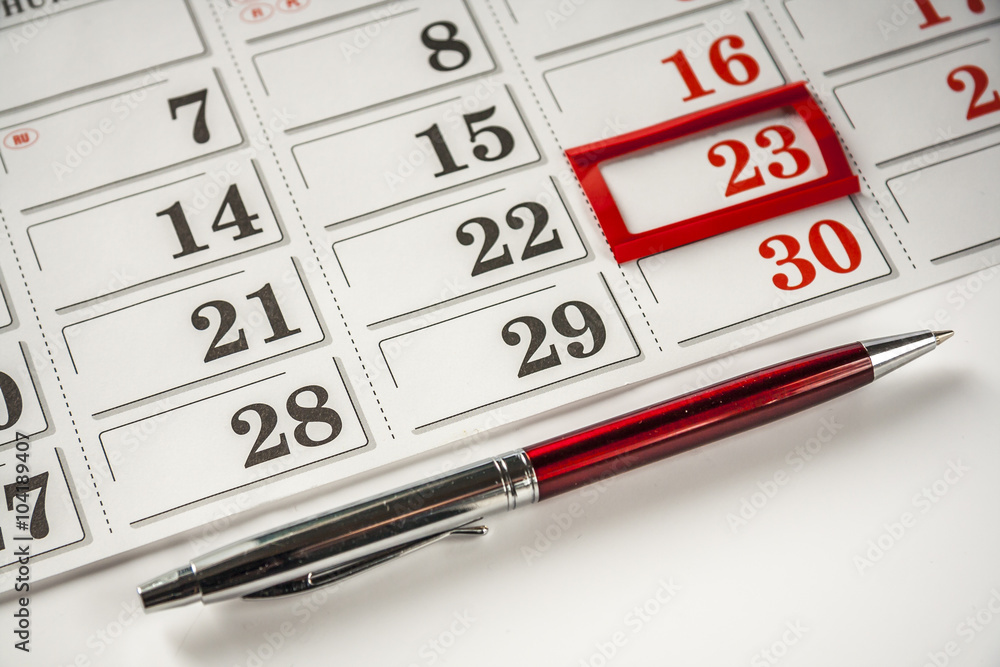 Pen And Important Date On Calendar