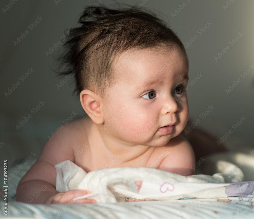 cute baby with dark hair Stock Photo | Adobe Stock