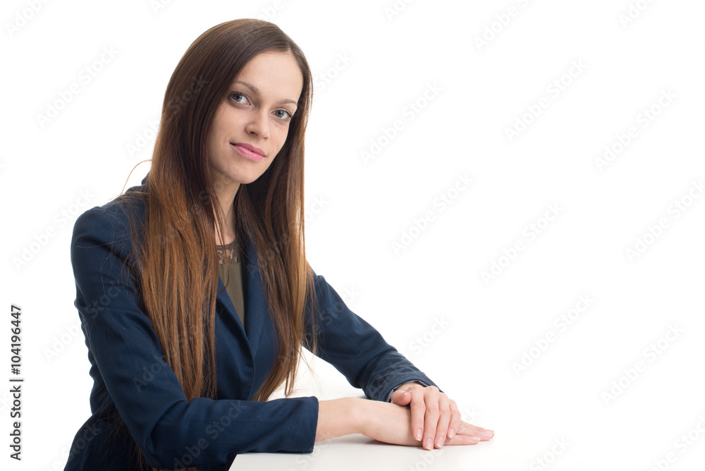 smiling businesswoman sitting at her desk smiling businesswoman sitting at her desk