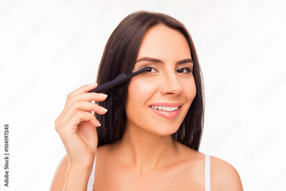 Portrait of cute girl doing maquillage with brash of mascara Portrait of cute girl doing maquillage with brash of mascara