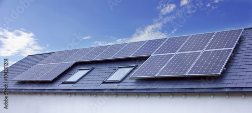 Solar Panels On House Roof. Sustainable Renewable Energy