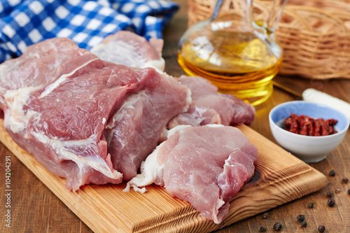 Fresh raw pork  meat on a cutting board