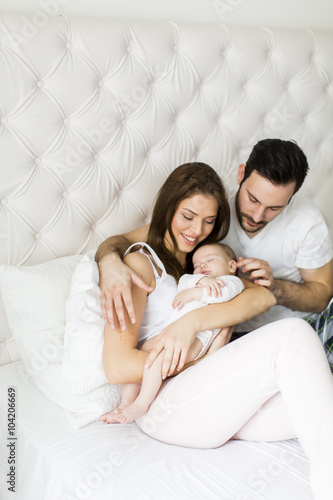 Happy family with newborn baby