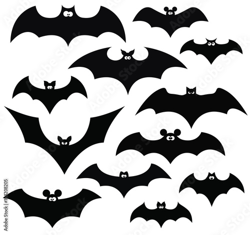 Cartoon set of black silhouettes of bats  vector