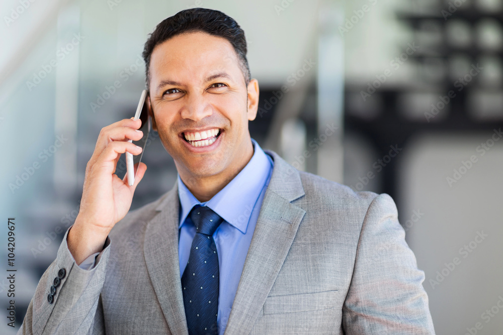 middle aged businessman talking on mobile phone middle aged businessman talking on mobile phone
