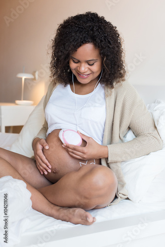 Fotografia, Obraz Woman using a fetal doppler at home