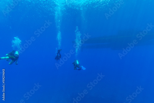 Group of Divers near Boat Underwater © Rostislav Ageev