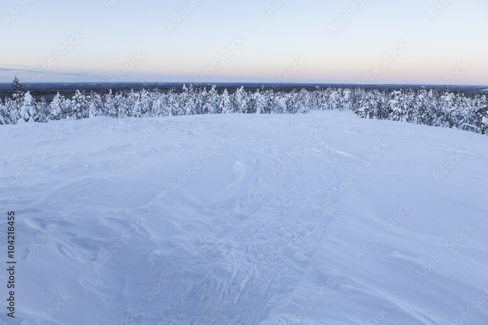 Winter landscape on a sunset. Mountains, Finland.