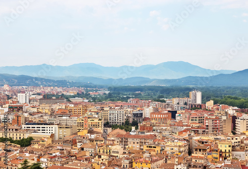 Picturesque city of Girona surrounded by mountains