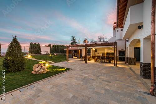 Luxurious villa exterior and magic sky photo