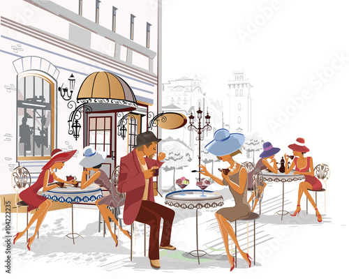 Fashion people in the street cafe in the city. 