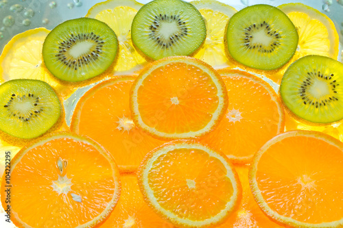 Background of fruit in water with bubbles