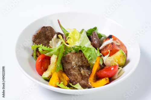 salad with meat,egg, tomatoes, olives and vegetables © Aleksei Zakharov