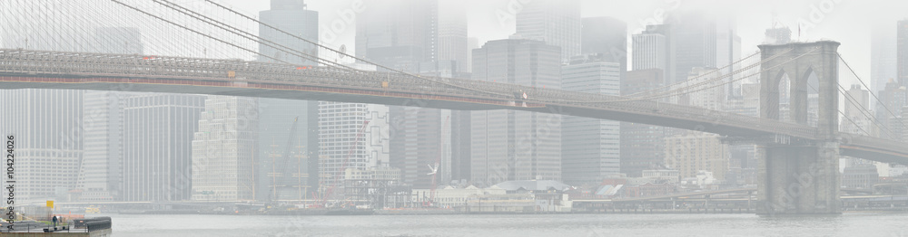 Brooklyn Bridge at fog.