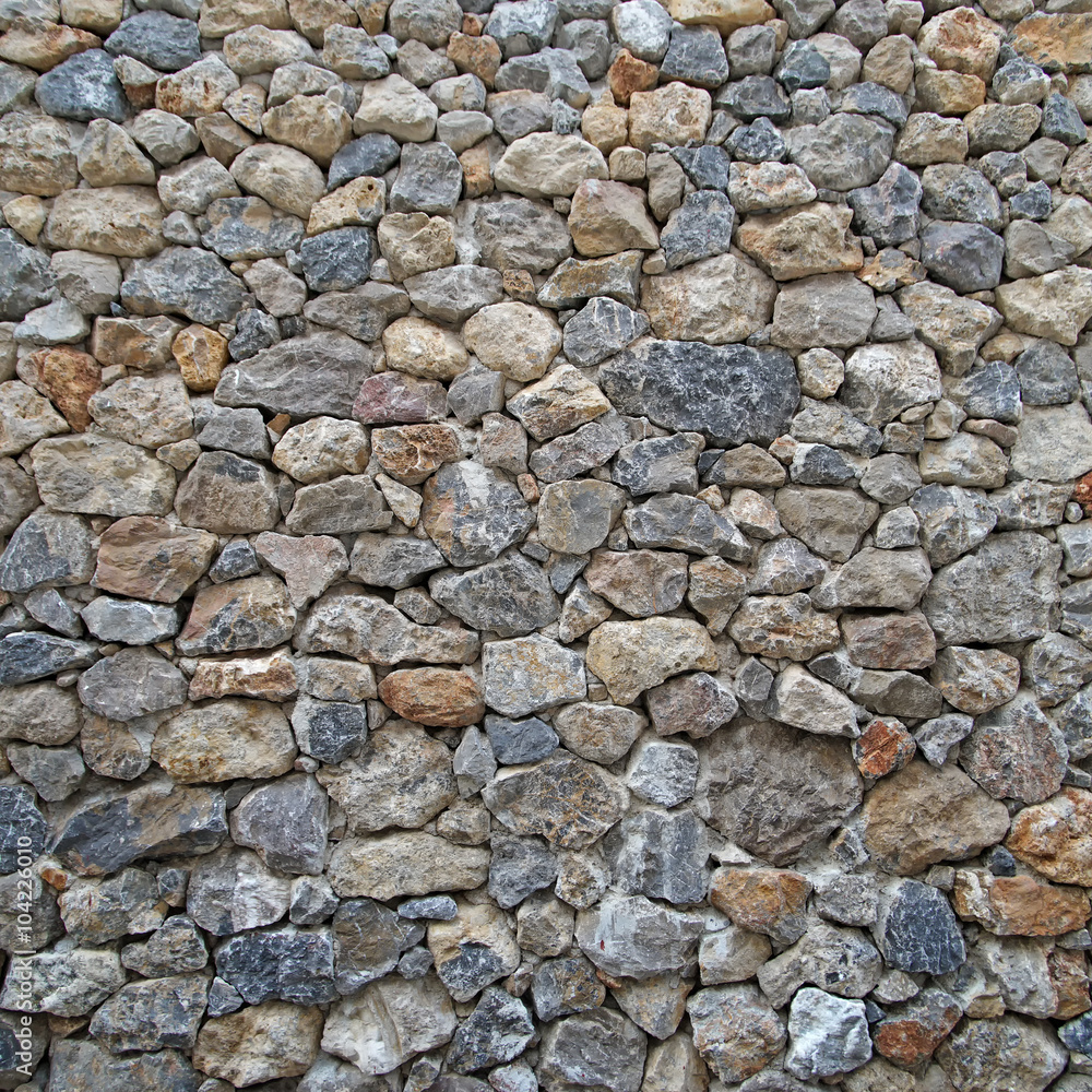 Stone wall background or texture