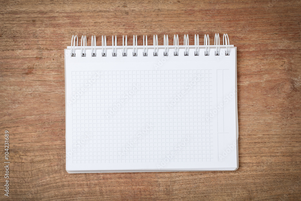 Open notebook on wooden background Open notebook on wooden background