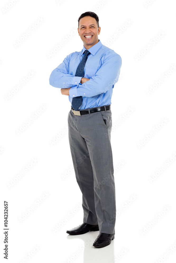 mature businessman with arms folded