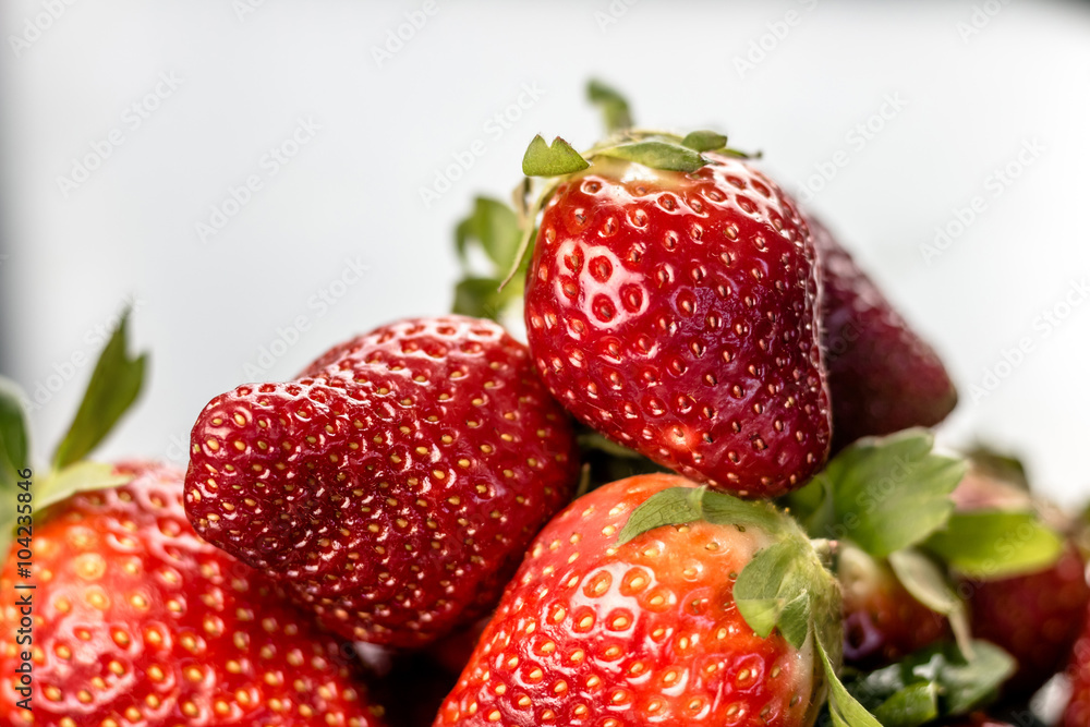 Half of strawberry isolated on white background Half of strawberry isolated on white background