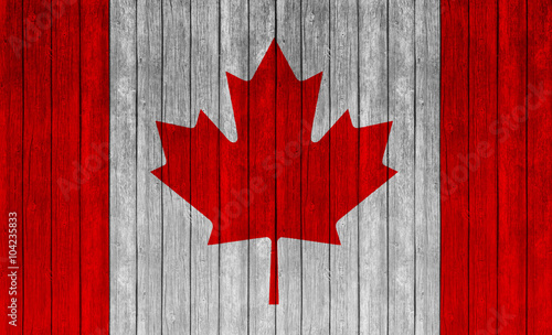canadian flag on wood textu...