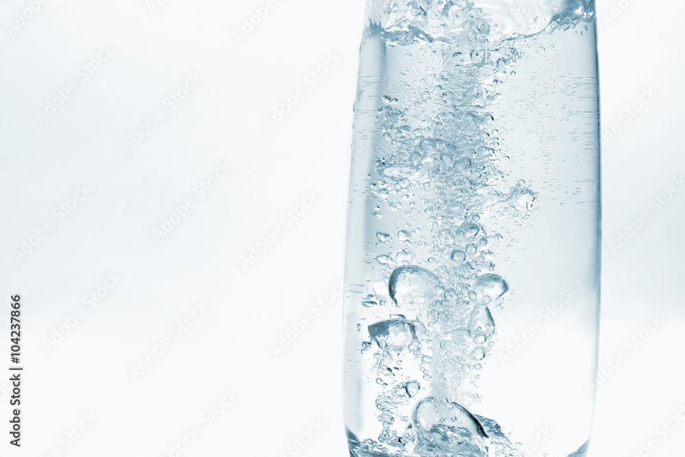 water pouring in transparent glass with bubbles of air water pouring in transparent glass with bubbles of air