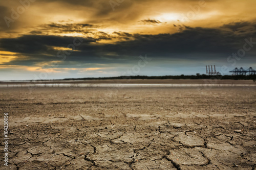 Land with dry and cracked ground. Desert