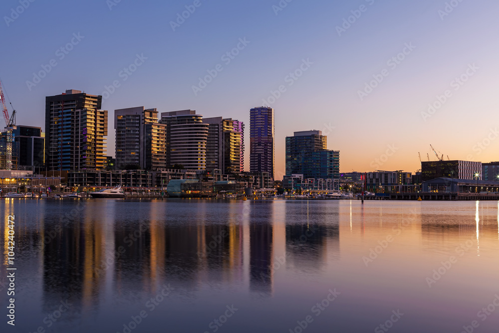 Docklands, Melbourne residential buildings and Yarra waterfront at dawn