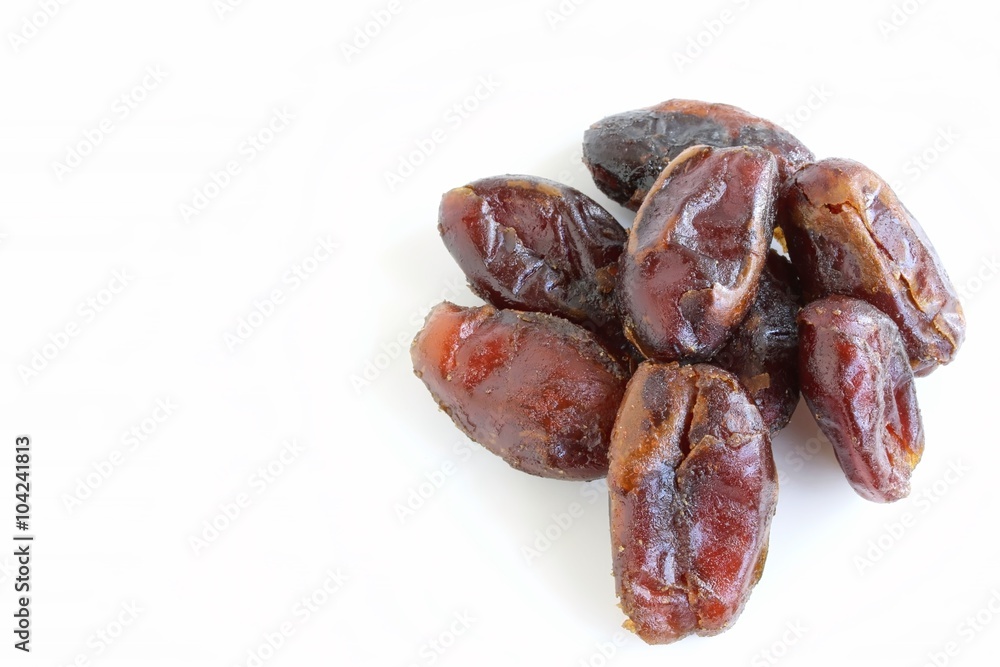 Dried Pitted Dates on White Background Dried Pitted Dates on White Background
