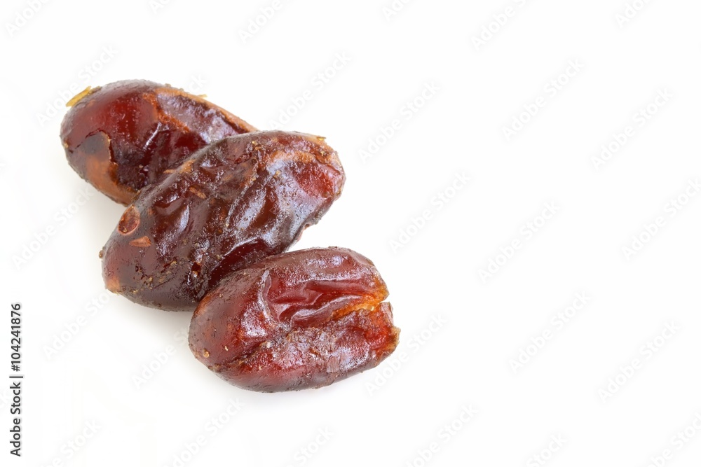 Dried Pitted Dates on White Background Dried Pitted Dates on White Background