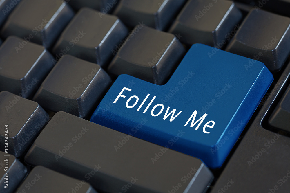 Word 'Follow Me' on enter keyboard - social media concept Word 'Follow Me' on enter keyboard - social media concept