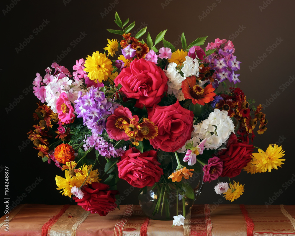 Still life with bouquet on a dark background.