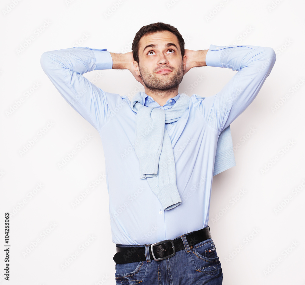 happy young man in blue shirt. happy young man in blue shirt.