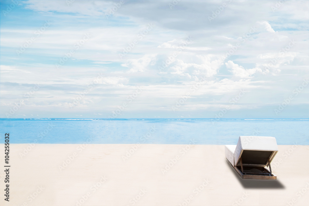 The beach in summer, clear sand and blue sky with beach chair, idyllic travel background The beach in summer, clear sand and blue sky with beach chair, idyllic travel background