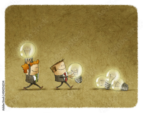 Two men holding lighted bulbs