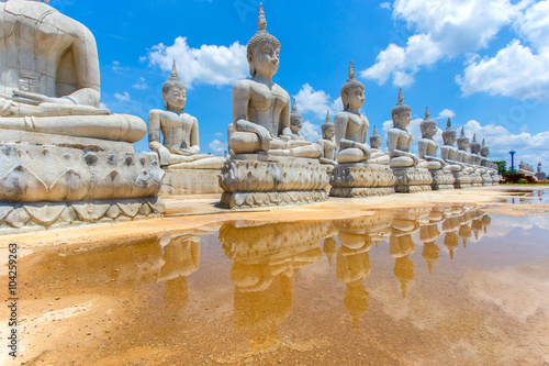 Buddha statue and blue sky, Nakhon Si Thammarat Province, Thailand photo