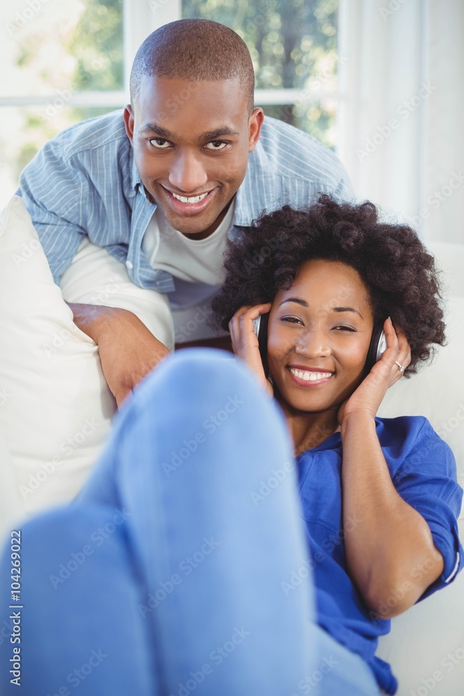 Portrait of smiling couple in the living room Portrait of smiling couple in the living room