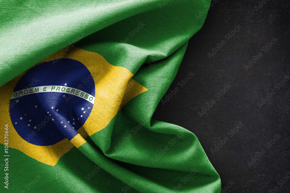 Fototapeta premium Flag of Brazil on blackboard background
