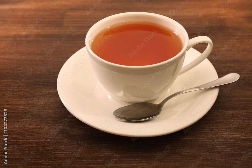 Cup of tea on wooden table Cup of tea on wooden table
