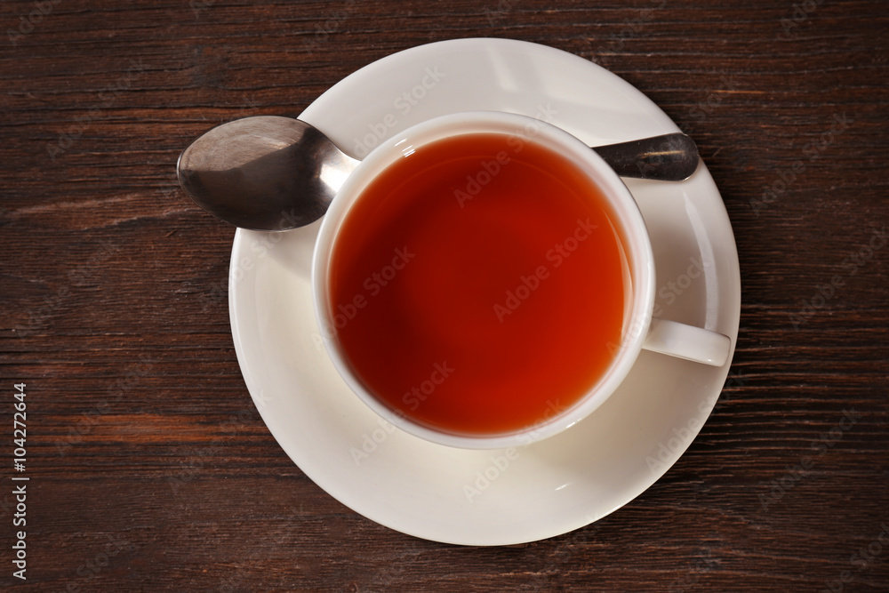 Cup of tea on wooden table Cup of tea on wooden table