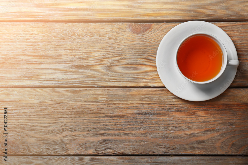 Cup of tea on wooden table Cup of tea on wooden table