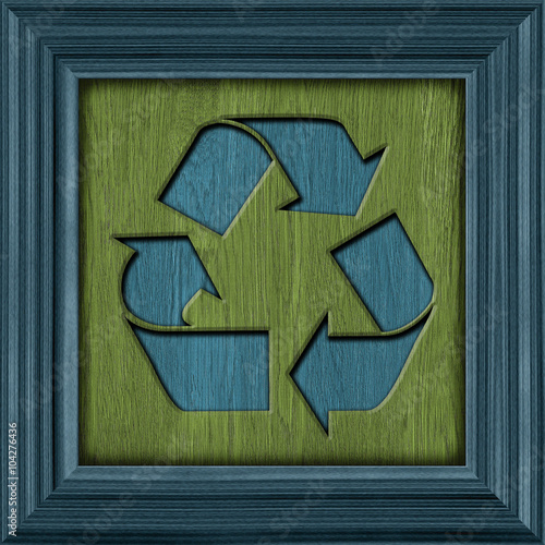 recycling symbol on a wooden frame