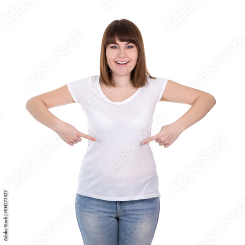 happy beautiful plus size woman pointing on blank white t-shirt