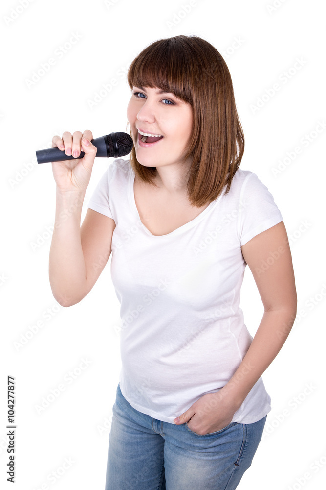 young beautiful woman singing with microphone isolated on white young beautiful woman singing with microphone isolated on white