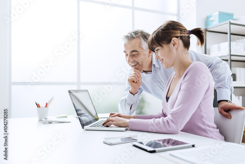 Business people working at office desk