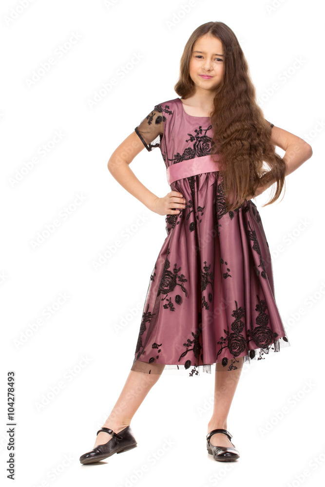 Long haired girl of six years in a summer dress