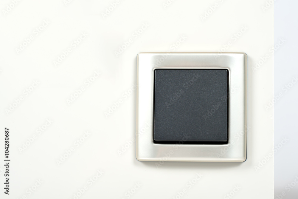 light switch with silver frame on the wall light switch with silver frame on the wall
