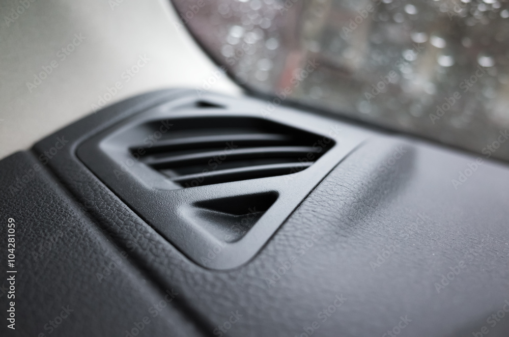 Ventilation grille, car interior detail, closeup Ventilation grille, car interior detail, closeup
