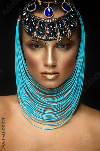 Beautiful woman portrait with jewelry in egyptian style 